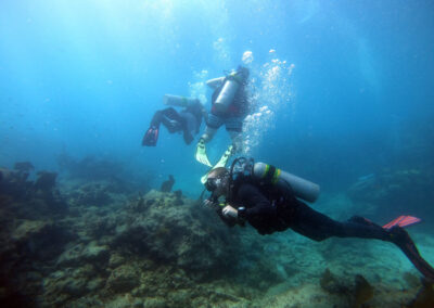 Divers along one of the many locations within the Molasses reef