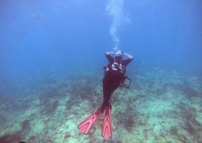 Dive Master Maria enjoying the current