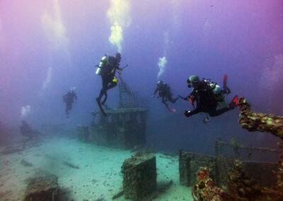 Students gather around the top deck of the USS Spiegel Grove